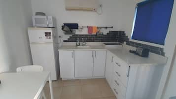 Family Chalet, 2 Bedrooms | Private kitchen | Fridge, microwave, coffee/tea maker, electric kettle