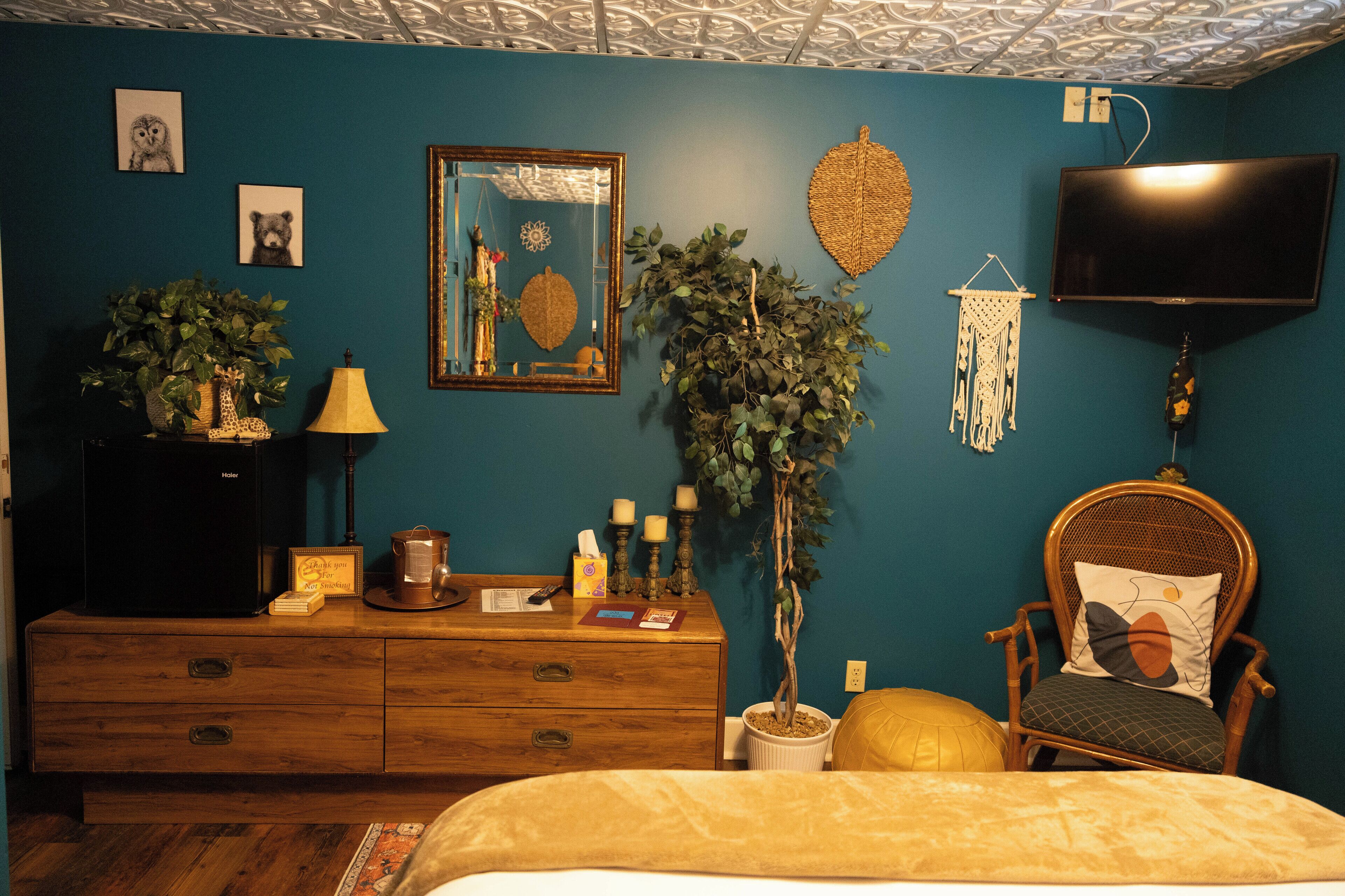 comfort room | premium bedding, desk, iron/ironing board, free cots/infant beds