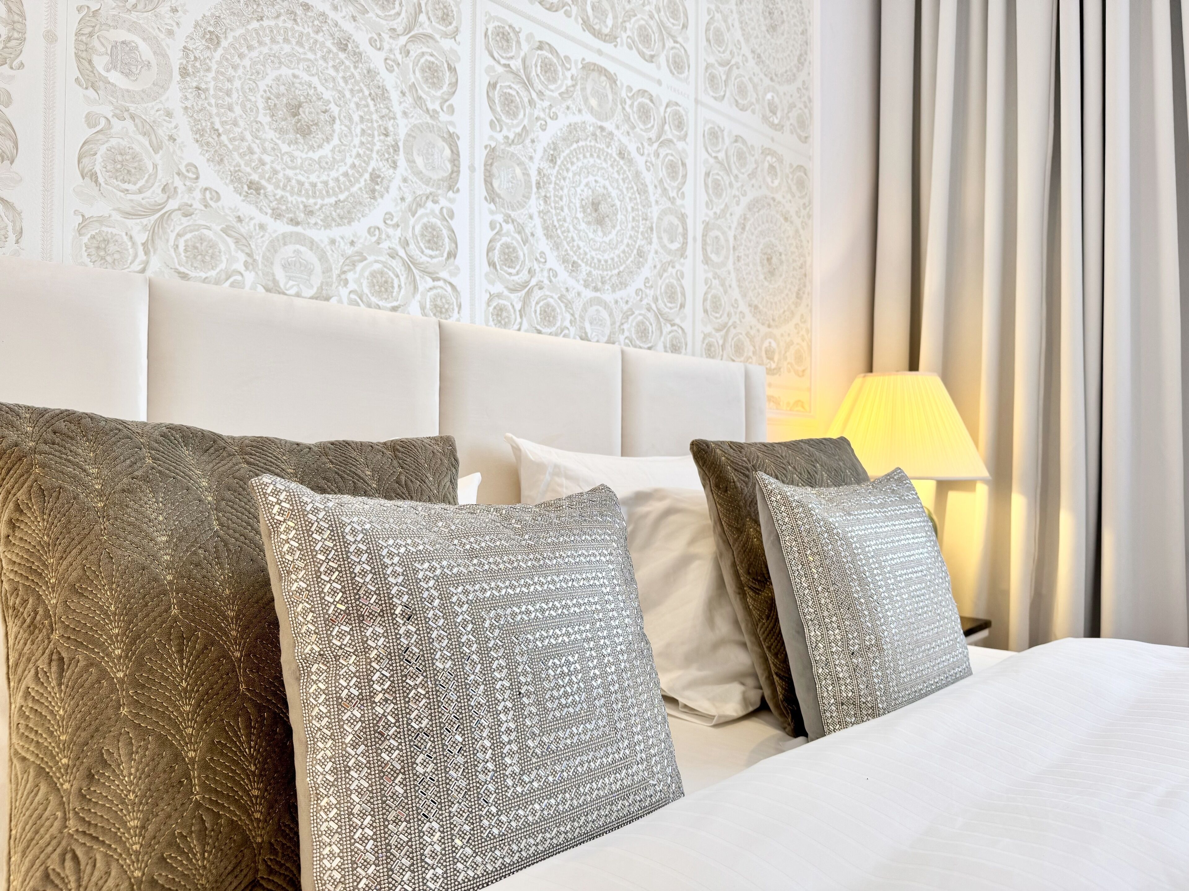 Egyptian cotton sheets, premium bedding, down duvets, memory-foam beds