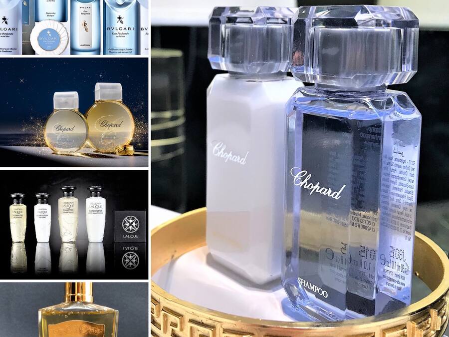 Una selección de productos de tocador de lujo, incluyendo Bvlgari, Chopard, L'ALIQUE y Floris.