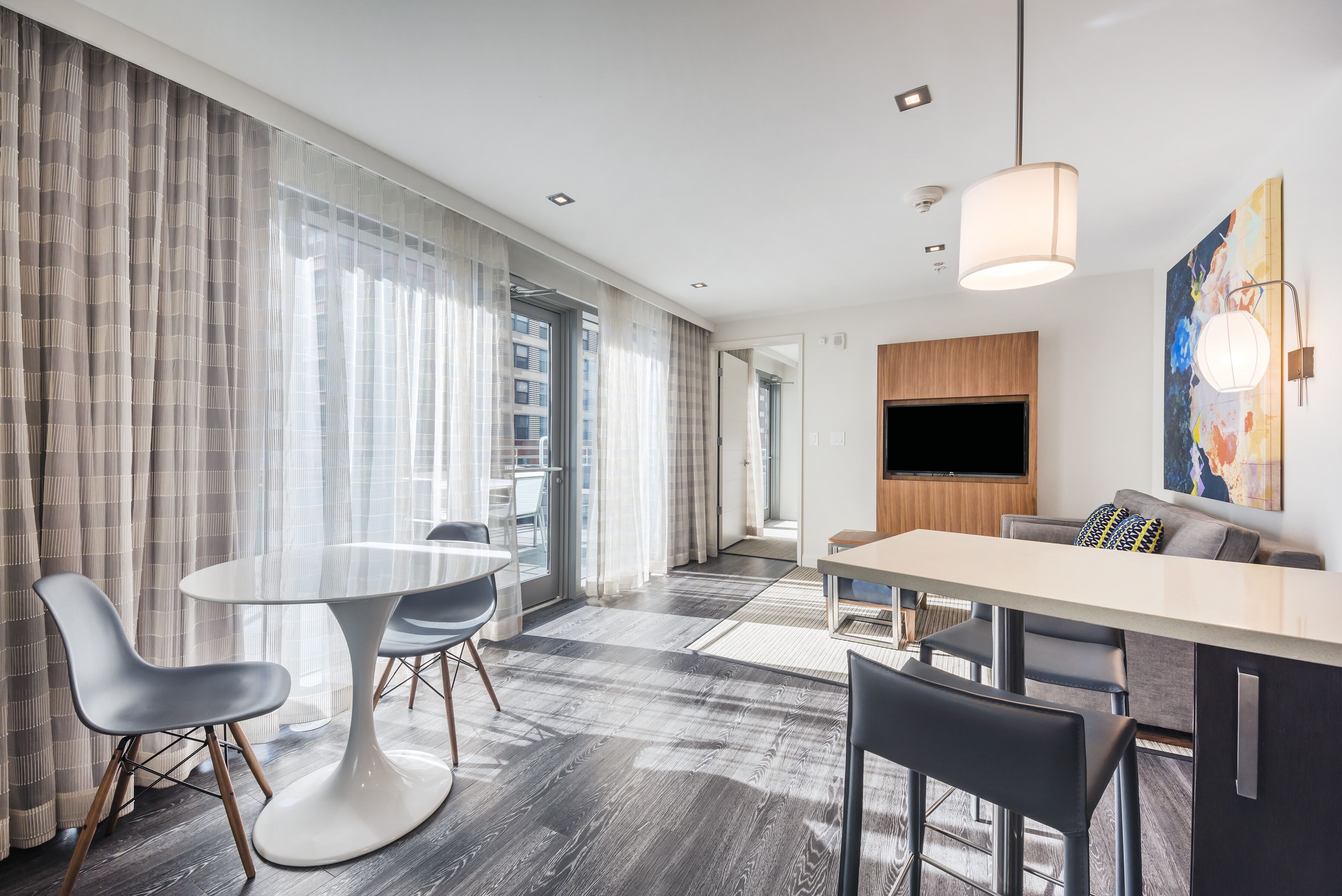 deluxe suite, 1 king bed with sofa bed, non smoking | premium bedding, in-room safe, desk, iron/ironing board