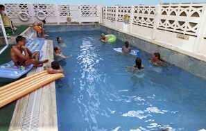 Outdoor pool, pool umbrellas, sun loungers