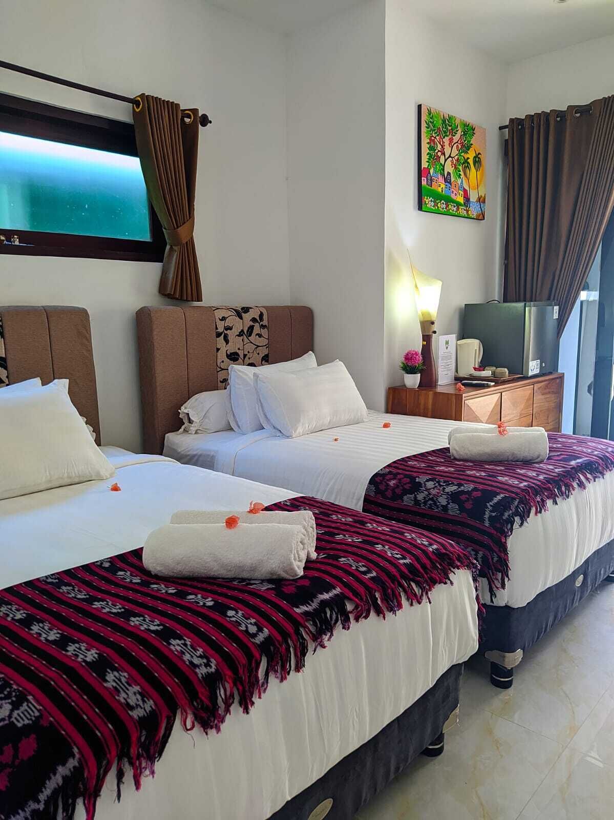 Habitación estándar con 1 cama doble o 2 individuales | Edredones de plumas, minibar, caja fuerte y decoración individual