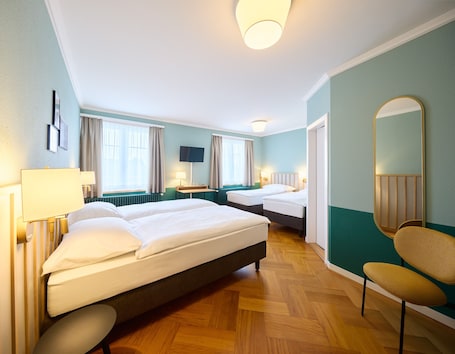 Familienzimmer | Schreibtisch, Bügeleisen/Bügelbrett, kostenloses WLAN, Bettwäsche