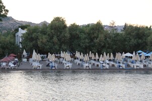 Private beach, sun loungers, beach umbrellas