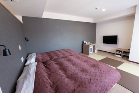 Desk, blackout drapes, iron/ironing board, free WiFi. Toyota Prestige Hotel