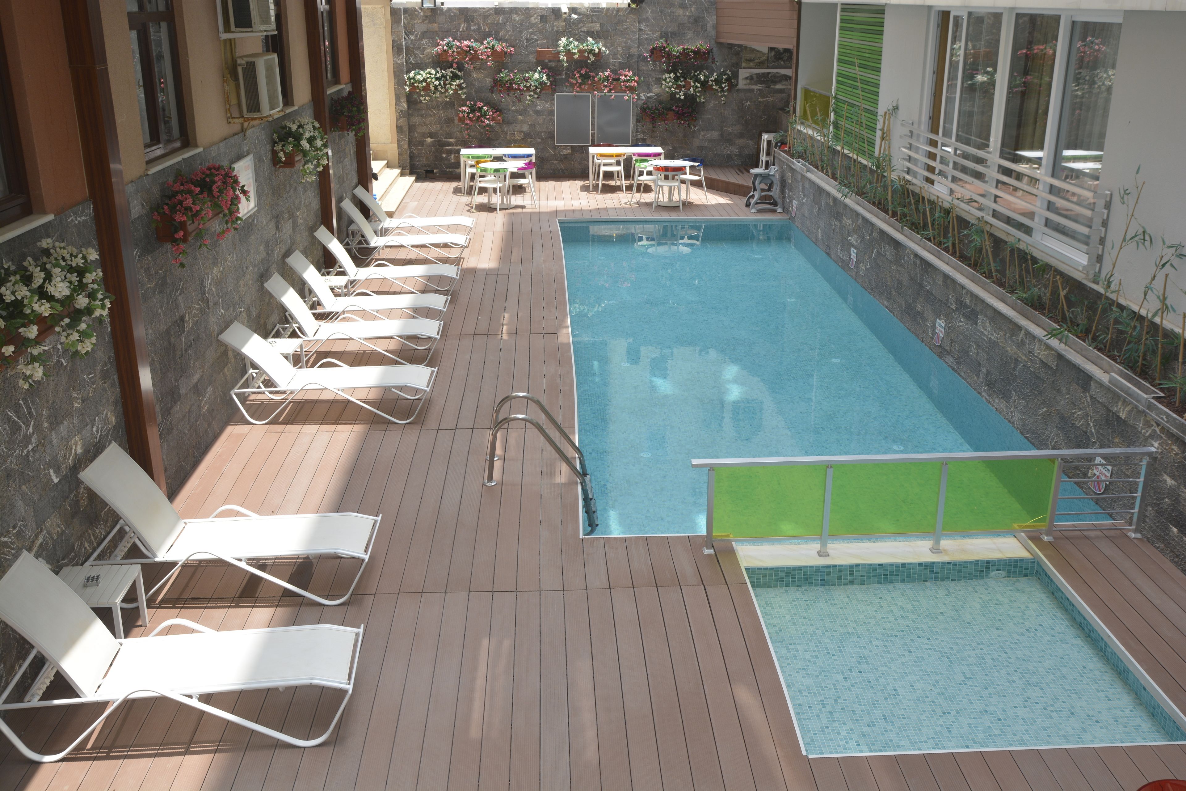 Outdoor pool, pool umbrellas, pool loungers