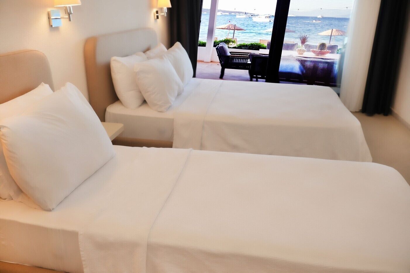 Casa executiva, 2 quartos, vista para o mar, de frente para a praia | Roupas de cama premium, cortinas blackout, Wi-Fi de cortesia