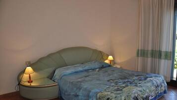 Apartment, 1 Bedroom | 1 bedroom, cots/infant beds, WiFi