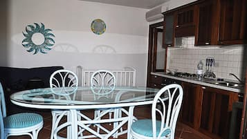 Apartment, 1 Bedroom | Living area | TV