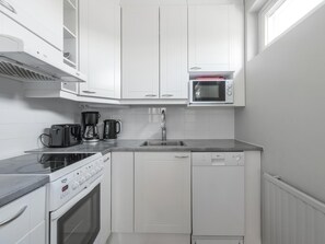Private kitchen - Kotimaailma Apartments Joensuu (Joensuu)