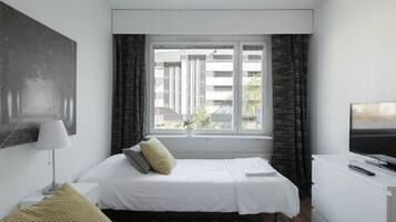 Individually furnished, desk, laptop workspace, iron/ironing board