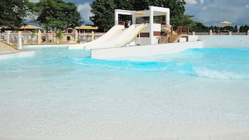 12 outdoor pools, pool umbrellas, pool loungers