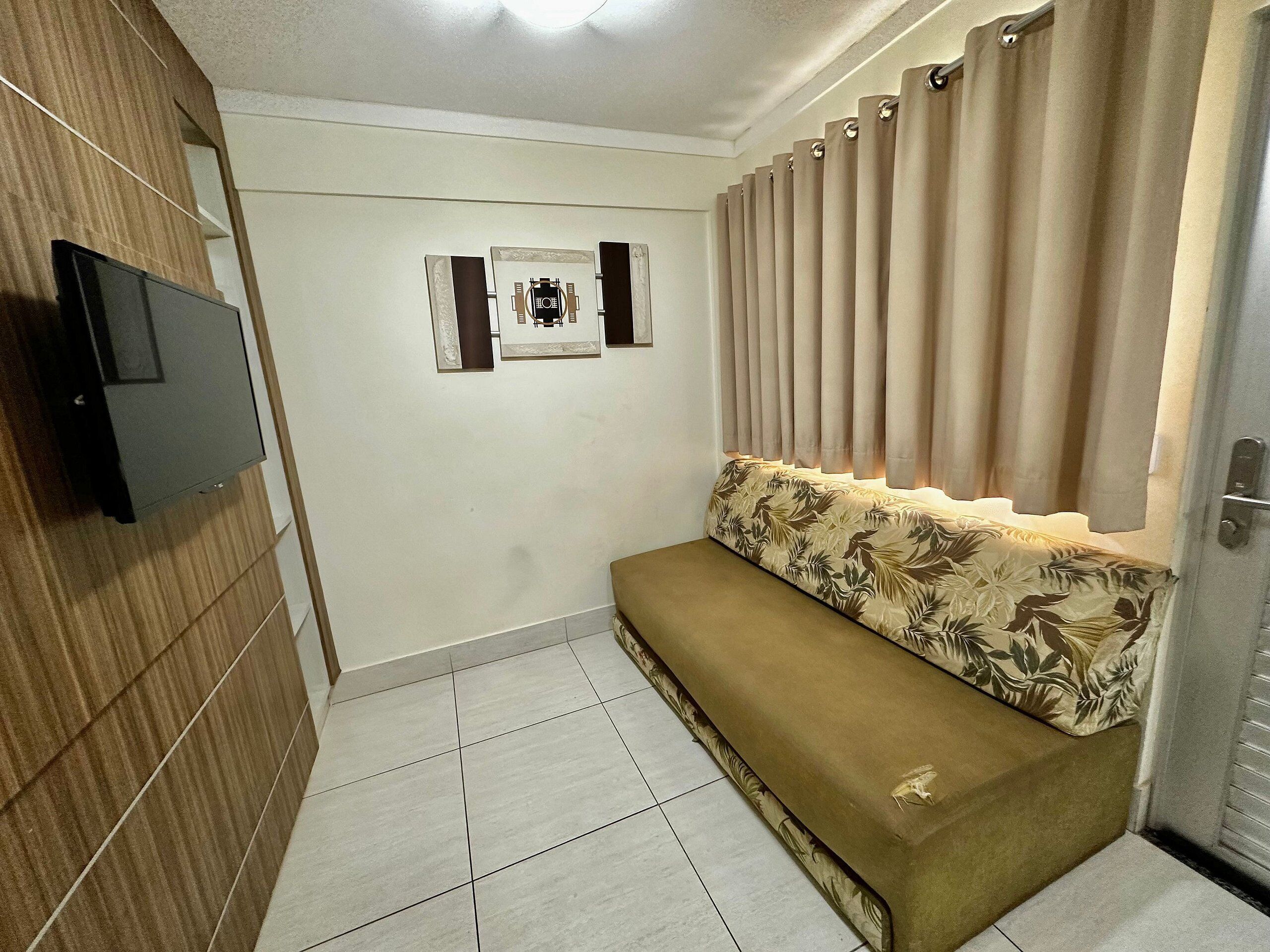 Apartamento | Área de estar | TV de tela plana