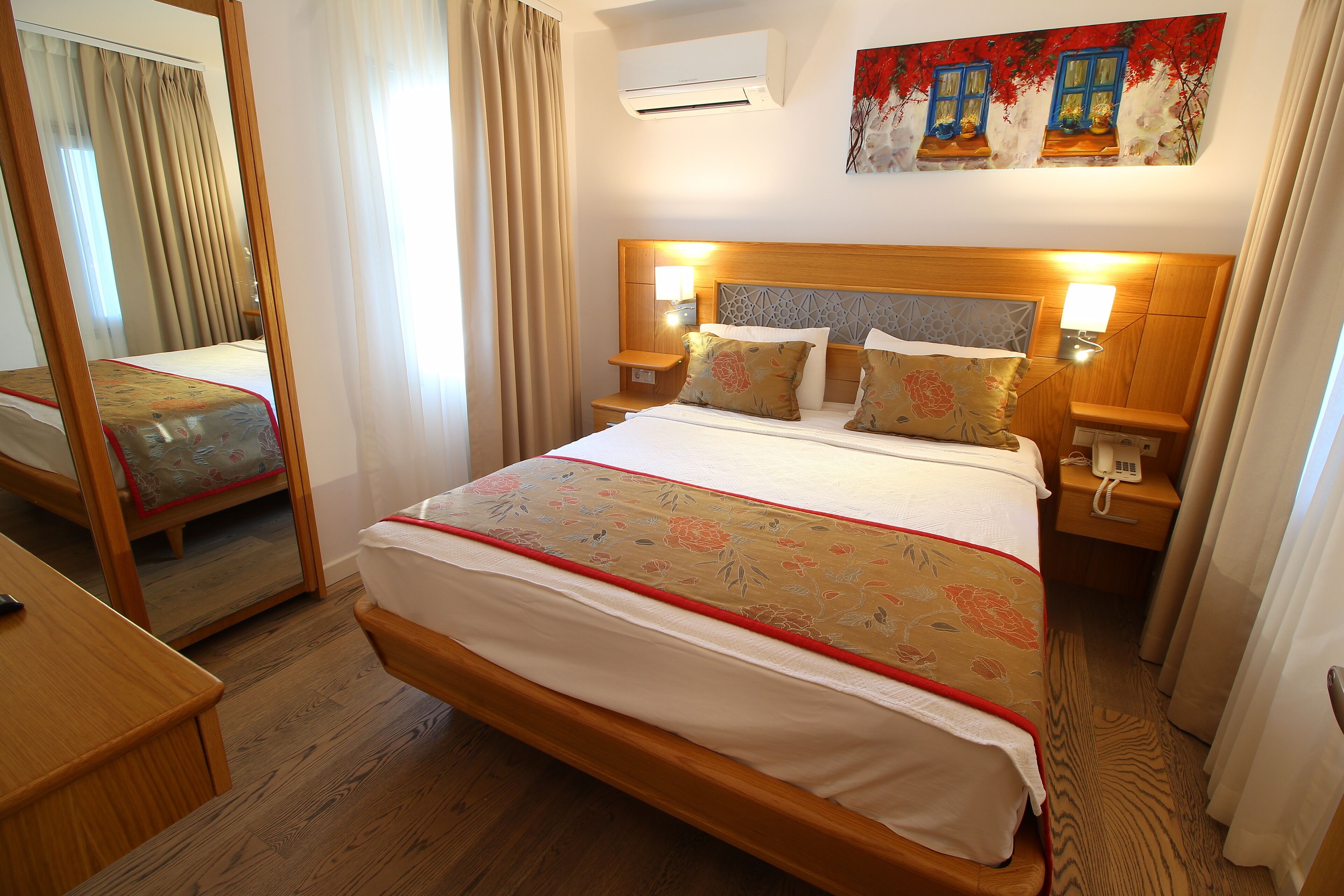 deluxe quadruple room, 1 bedroom | free minibar, in-room safe, desk, laptop workspace