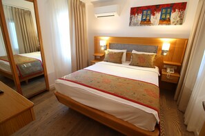 Deluxe Quadruple Room, 1 Bedroom | Free minibar, in-room safe, desk, laptop workspace - The Losh (Bodrum)
