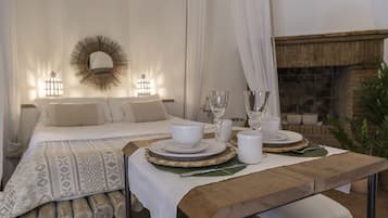 Suite Design, letti multipli, al piano terra | Pasti in camera