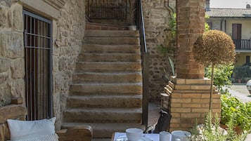 Suite de diseñador, varias camas, planta baja | Terraza o patio