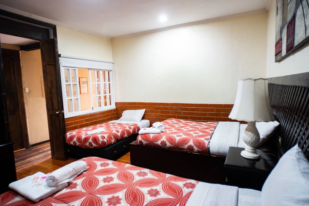 Premium bedding, down duvets, desk, laptop workspace