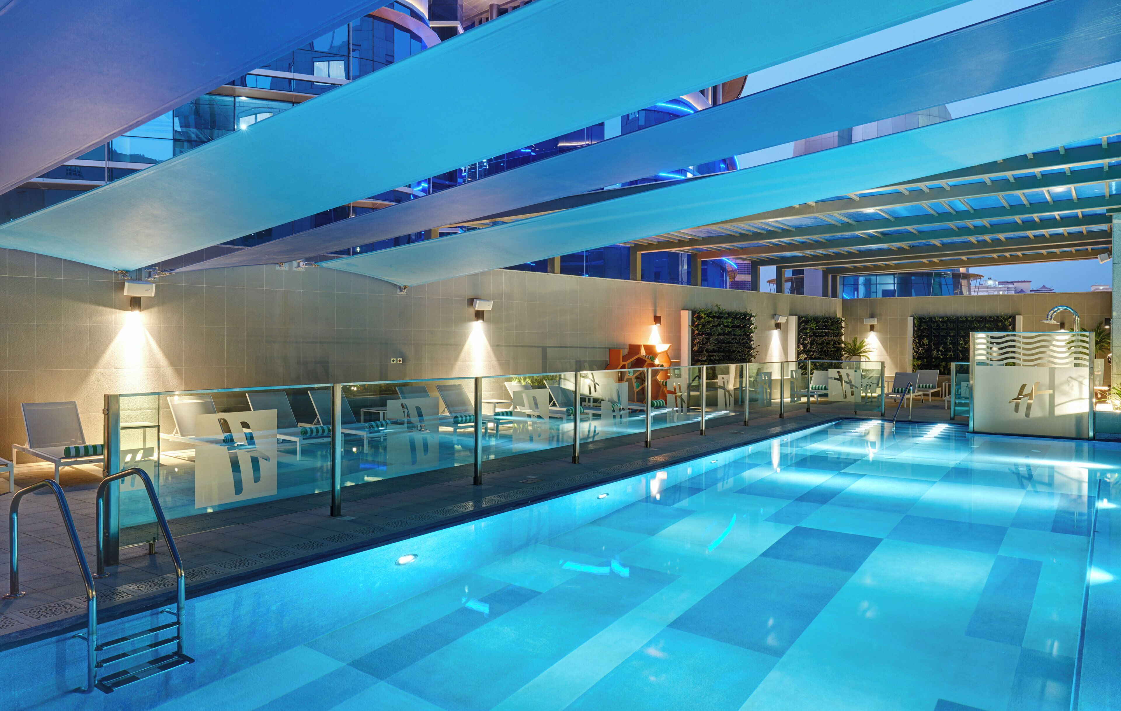Outdoor pool, open 6:00 AM to 8:00 PM, sun loungers, lifeguards on site