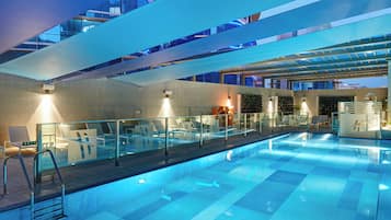 Outdoor pool, open 6:00 AM to 8:00 PM, sun loungers, lifeguards on site