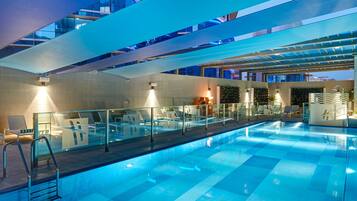 Outdoor pool, open 6:00 AM to 8:00 PM, sun loungers, lifeguards on site