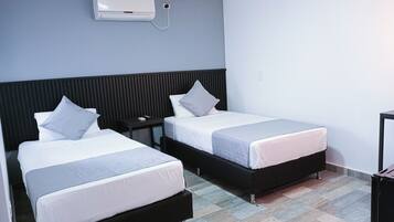 Twin Room, 1 Bedroom | Minibar, in-room safe, desk, laptop workspace