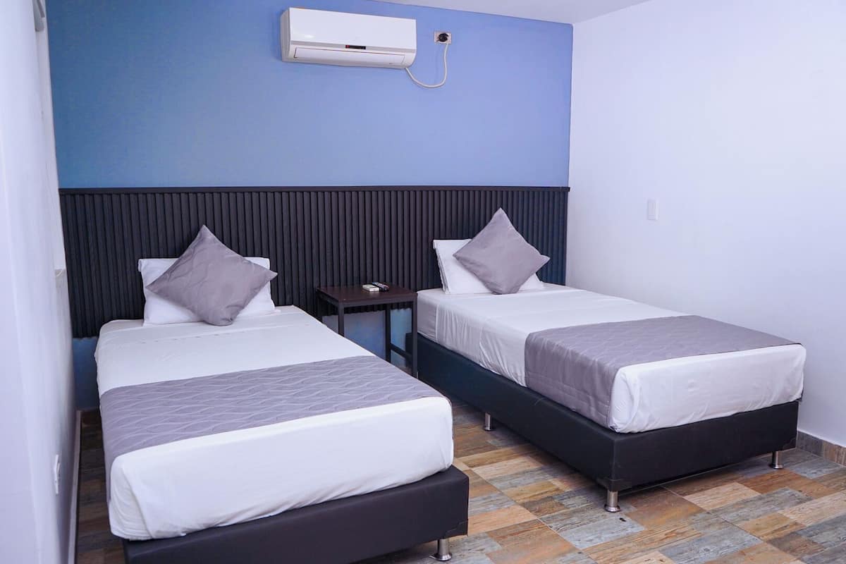Twin Room, 1 Bedroom | Minibar, in-room safe, desk, laptop workspace