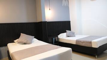 Triple Room, 1 Bedroom | Minibar, in-room safe, desk, laptop workspace