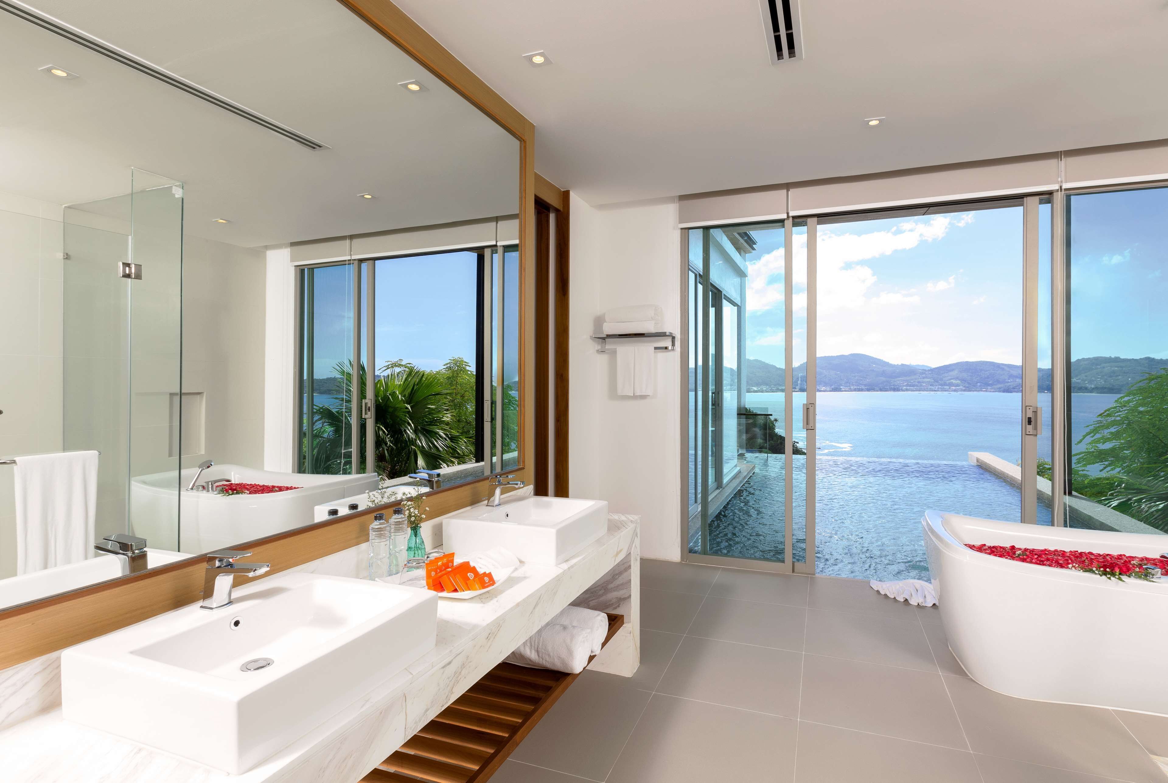villa, 1 king bed, ocean view (top floor pool) | bathroom | shower, eco-friendly toiletries, hair dryer, bathrobes