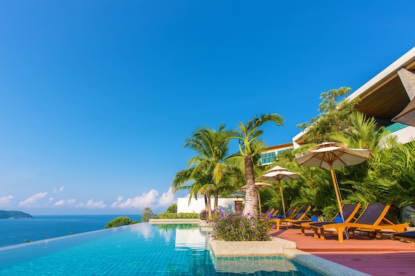 2 outdoor pools, pool umbrellas, sun loungers