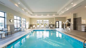 Indoor pool, open 6 AM to midnight, pool loungers