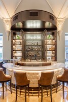 3 bars/lounges, lobby lounge, rooftop bar