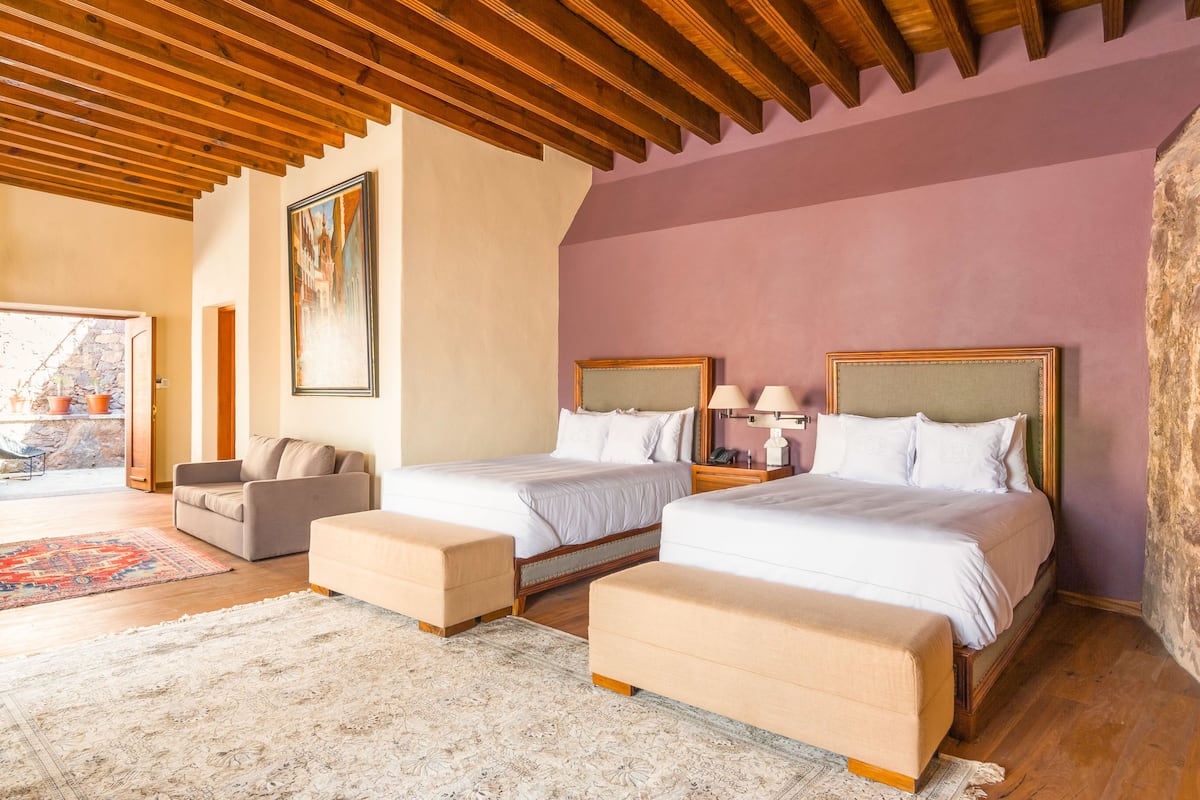 Deluxe Suite, 2 Queen Beds | Premium bedding, minibar, in-room safe, desk