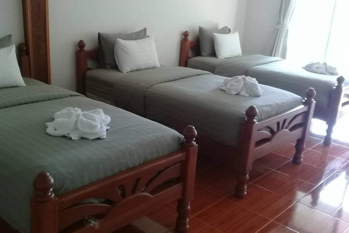 Family Room | Minibar, blackout drapes, rollaway beds, free WiFi