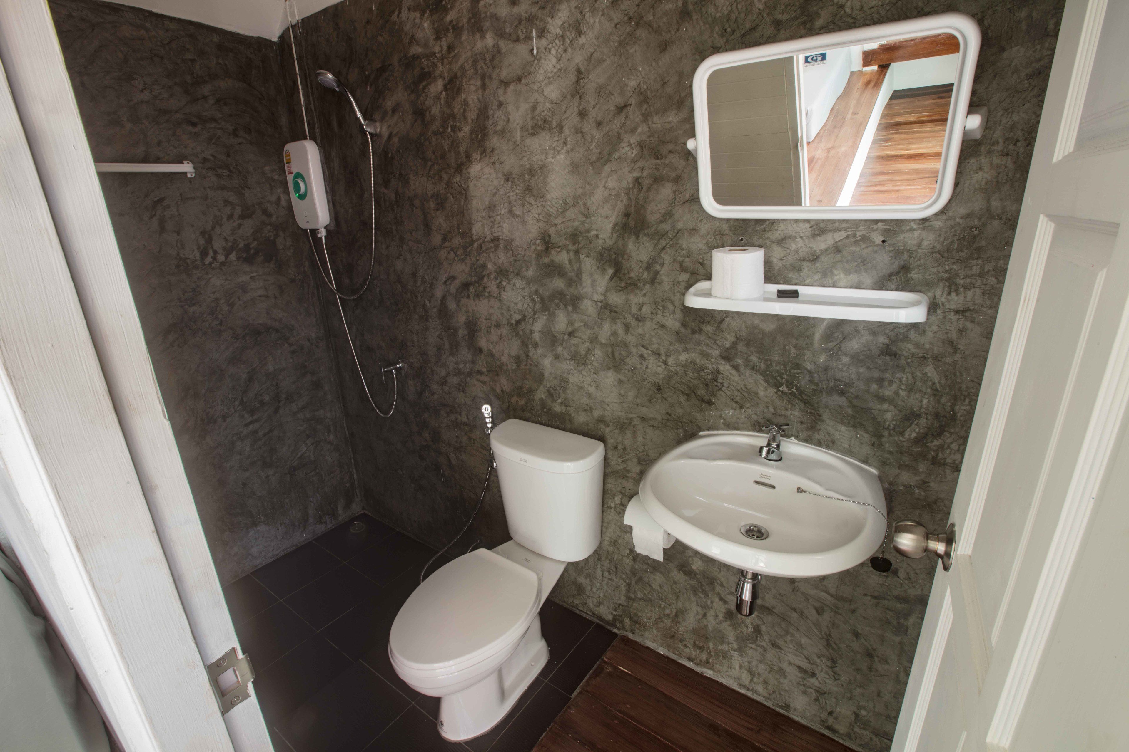 standard bungalow with fan | bathroom | shower, towels