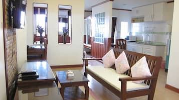 Studio Room | Living area | Flat-screen TV