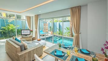 Duplex One Bedroom Pool Villa | Living area | 32-inch LCD TV with cable channels, TV