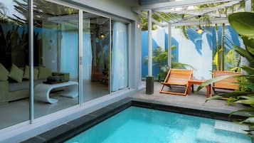 Premium One Bedroom Pool Villa | Minibar, in-room safe, individually decorated, individually furnished