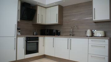 Luxury Apartment, 1 Bedroom (The Amber) | Private kitchen | Full-size fridge, microwave, oven, dishwasher