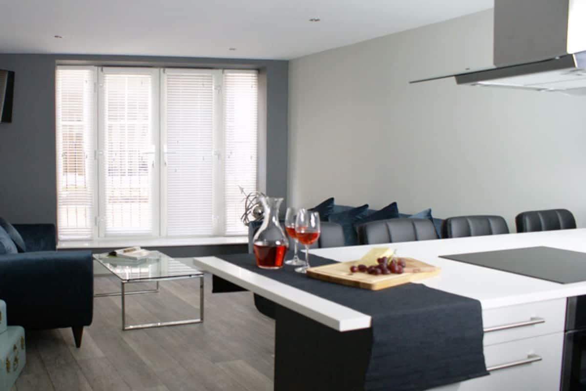 Luxury Apartment, 1 Bedroom (The Jasper) | Living area | 40-inch flat-screen TV with digital channels, TV, iPad