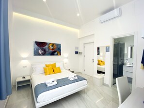 Comfort kamer | Donsdekens, bedden met traagschuimmatrassen, een minibar