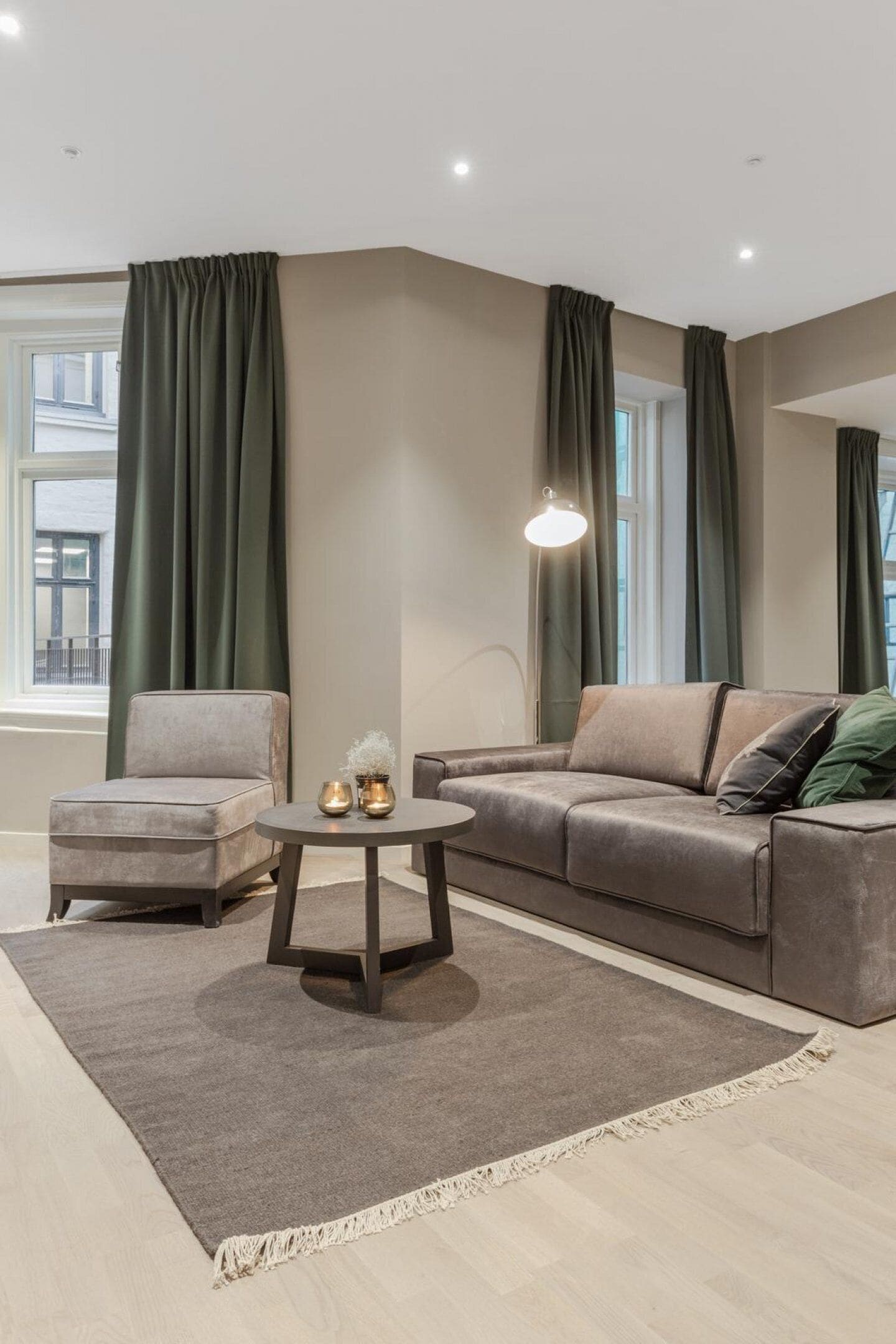 Departamento Confort | Área de sala de estar | Televisión de pantalla plana 