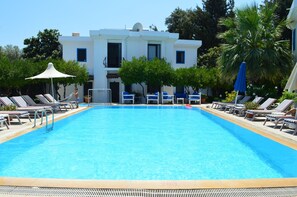 2 outdoor pools, open 8 AM to 8 PM, pool umbrellas, pool loungers