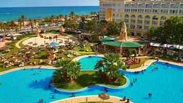 Indoor pool, outdoor pool, pool umbrellas, sun loungers