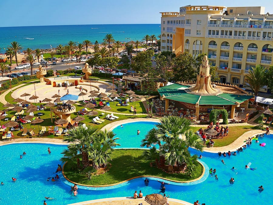 Indoor pool, outdoor pool, pool umbrellas, sun loungers