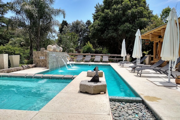 Outdoor treatment areas, sauna, hot tub, body treatments, hydrotherapy