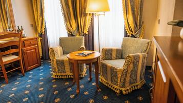 Superior Double Room | Living area | Flat-screen TV