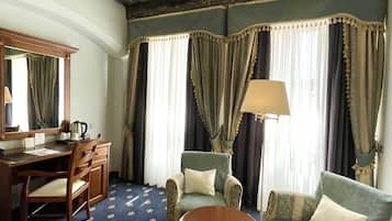 Superior Double Room | Living area | Flat-screen TV