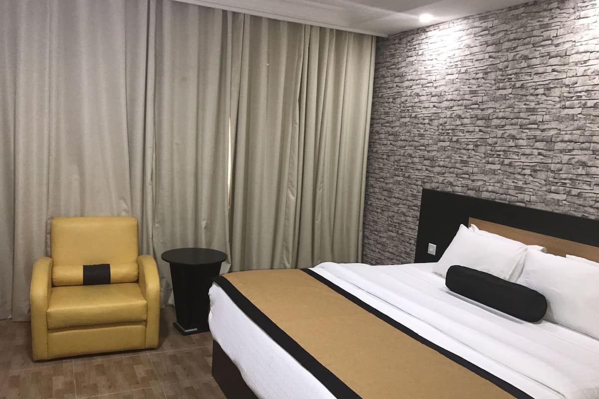 In-room safe, desk, blackout curtains, iron/ironing board
